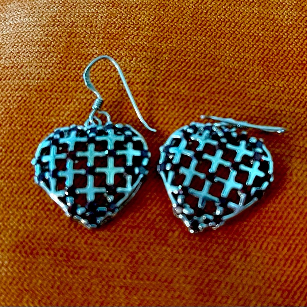 Sterling Silver & Garnet earrings. The hearts are one inch long with garnets.